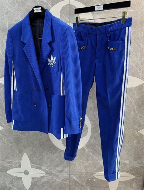 traje gucci x adidas